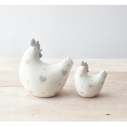 A chic white and grey chicken ornament with polka dots and hearts.
