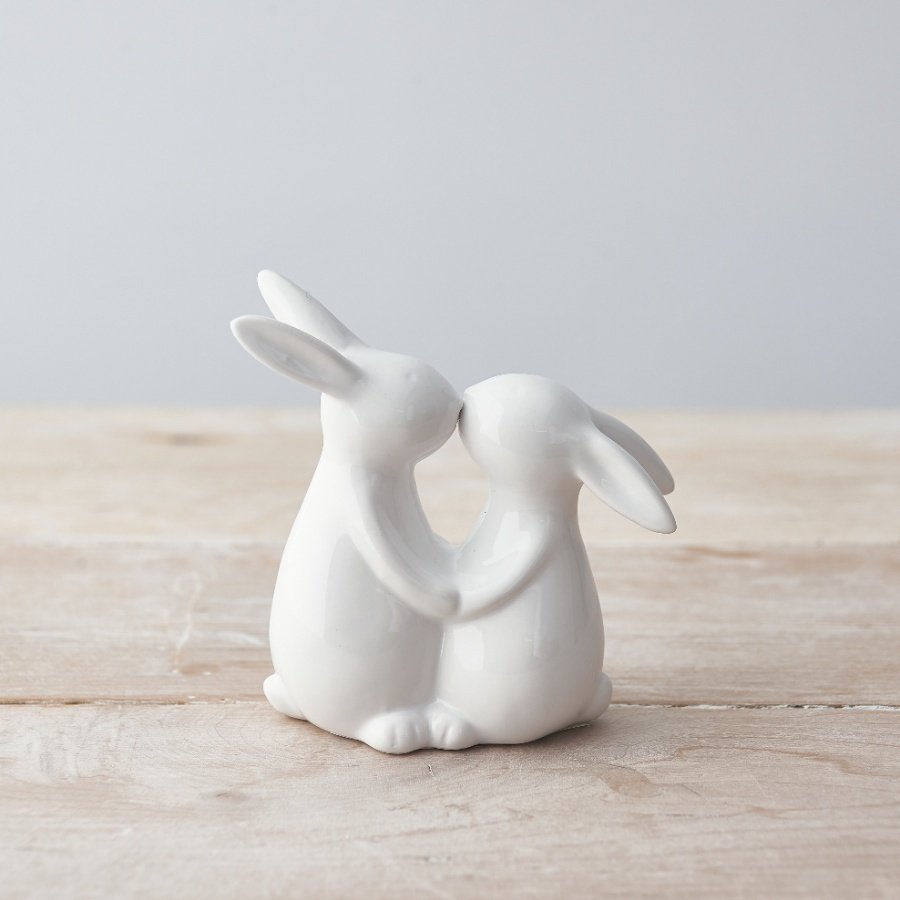 An adorable kissing bunny ornament with a glossy white finish. 