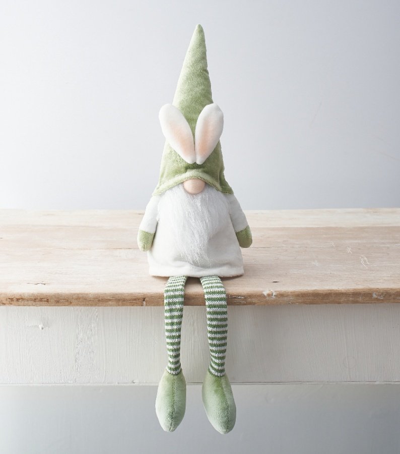 A charming shelf sitting gonk in a stunning sage green colour. Complete with bunny ears.