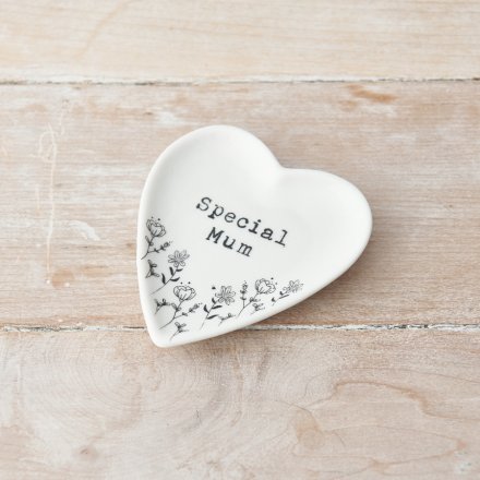 A chic heart shaped trinket dish with a pretty floral design.