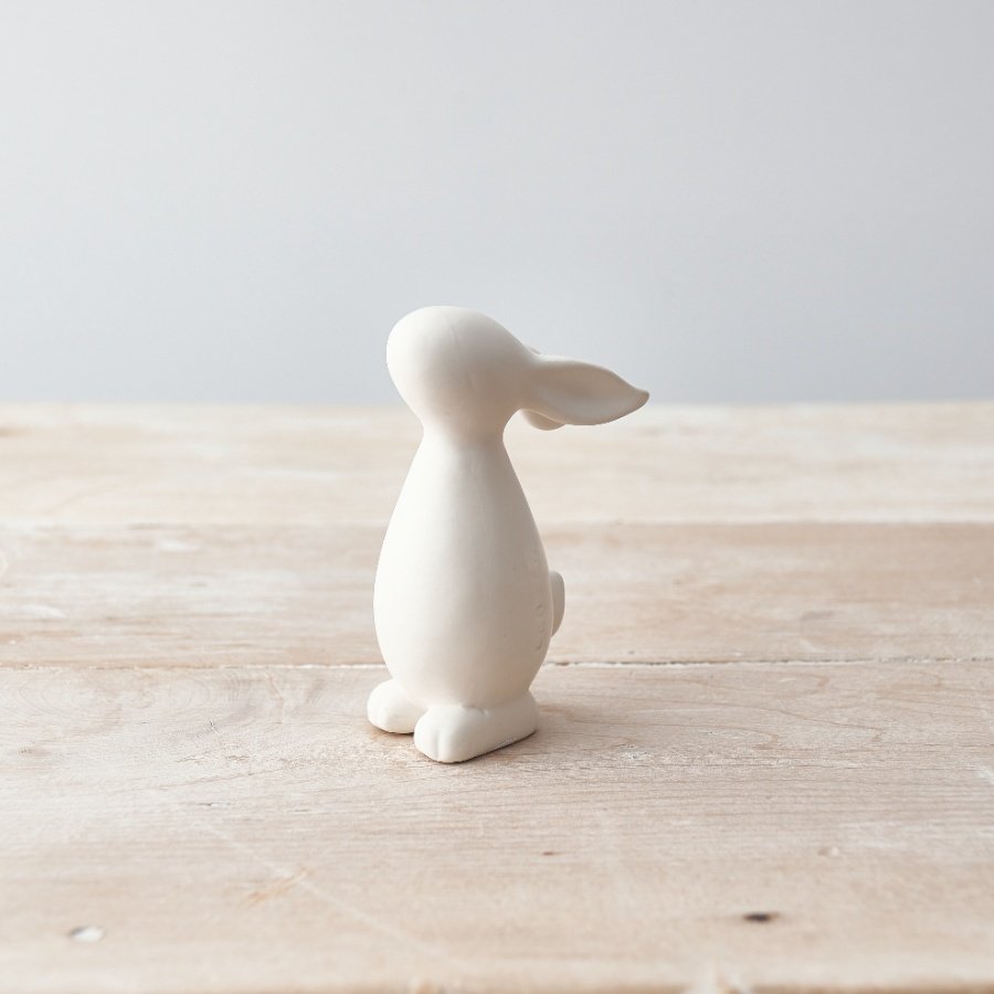 A contemporary and chic standing bunny ornament with a matte white finish.