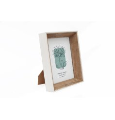 A stylish and unique wooden box photo frame with floral insert.