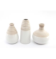 An assortment of 3 ceramic vases with hand finished detailing. 
