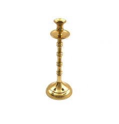 A chic and elegant gold metal candle stick holder. A must have interior accessory to compliment many styles.