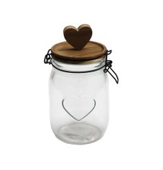 A stylish glass container with an embossed heart, complete with an air tight wooden lid and heart.