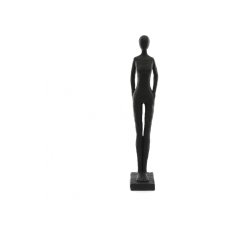 A sculptural standing figure decoration with carved detailing. A contemporary and stylish decorative accessory.