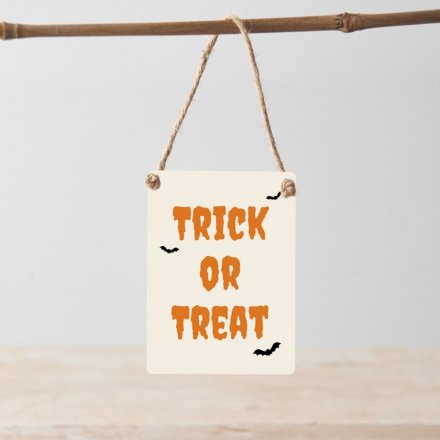 Trick or Treat. A stylish Halloween themed mini metal sign with jute string hanger.