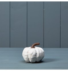 A chic ceramic pumpkin decoration with a rustic white glazed finish. A charming seasonal decoration for the home.