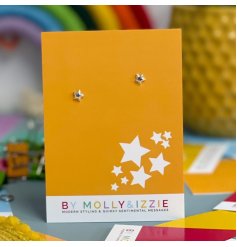 A beautiful pair of star shaped sterling silver earrings, set upon a vibrant backing card.