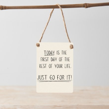 A chic mini metal sign with a motivational slogan.