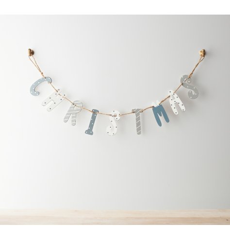 A stylish wooden garland in a snow mix of colours and patterns including polka dots and stripes.