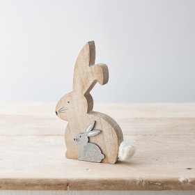 A gorgeous rabbit ornament in a rustic wooden finish. Complete with cute painted face and a fluffy pom pom tail