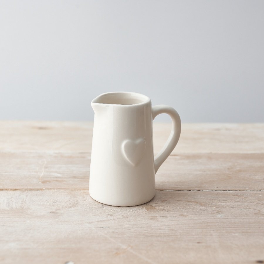 A stylish ceramic jug with an embossed heart. 