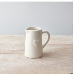A stylish ceramic jug with an embossed heart. 