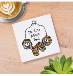 A fine quality ceramic coaster with a witty nuts slogan and quirky illustration.