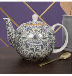 An elegant tea pot decorated with the stunning Lodden print by William Morris.