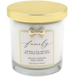 A beautifully scented candle set within a glass candle jar with a lovely family sentiment slogan. 