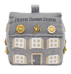 Home Sweet Home. A charming house shaped doorstop with a country cottage design, featuring bumble bees and flowers.