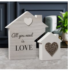 All You Need Is Love. A chic wooden house plaque with a love sentiment and hearts.