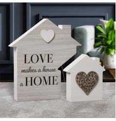A shabby chic style wooden house decoration with a lovely sentiment slogan.