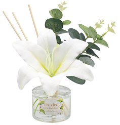 A unique and beautifully scented Lily and Black Orchid diffuser with artificial posy. 