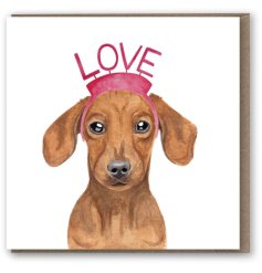 An adorable Dachshund greetings card. Hand painted with a LOVE headband. Perfect for gifting to loved ones. 