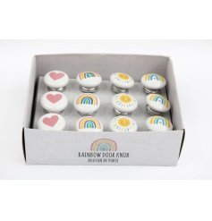 An assortment of beautifully decorated door handles with a rainbow theme. 