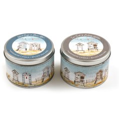 A mix of 2 seaside themed candle tins each holding a beautiful scented candle. 