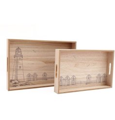 A set of 2 wooden trays depicting illustrated coastal scenes. 