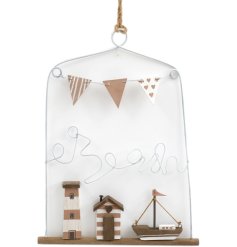 A charming wire frame hanging sign with miniature wooden beach hut, light house and boat. 