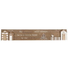 My heart will always be in a little house by the sea. A charming wooden sign with 3D beach huts and coastal details.