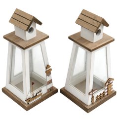 An assortment of 2 wooden lanterns in white and natural colours. Each has a coastal aesthetic with hand crafted details.