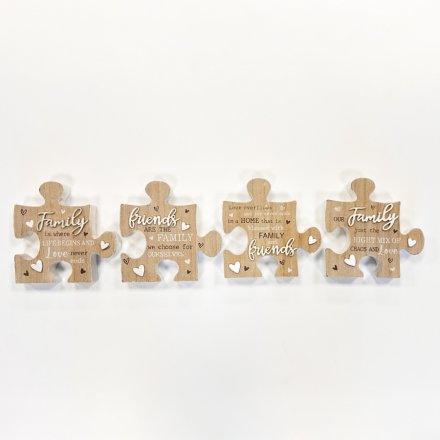 A mix of 4 wooden jigsaw signs each with a lovely family or friendship sentiment slogan. 