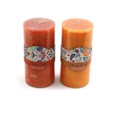 An assortment of 2 mottled pillar candles in rich earthy tones. Each has a summer tile gift wrap with a citrus scent. 