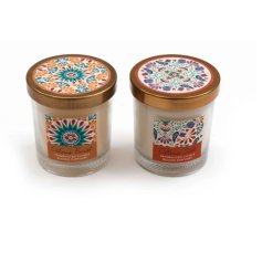 An assortment of 2 citrus scented candles set within glass candle jars with decorated lids. 