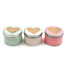 An assortment of 3 fragranced candle tins in stylish pastel colours with oh la la packaging. 