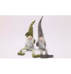 An assortment of 2 plush gonk decorations in richly coloured green and grey velvet fabric. 