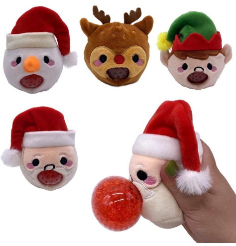 An assortment of 4 soft to touch Christmas Character toys with a squeezie function. 