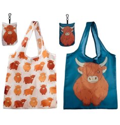An assortment of 2 stylish and practical highland cow designed shopping bags. 