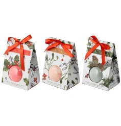 An assortment of 3 beautifully fragranced bath bombs in Christmas Winter Botanical gift boxes. Complete with bow. 