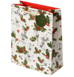 A fine quality Christmas Botanicals gift bag with a gold foil 'Happy Holidays' tag and ribbon handle. 