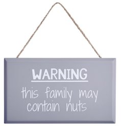 WARNING. This family may contain nuts. A humorous slogan printed on a grey painted wooden sign with jute string hanger. 