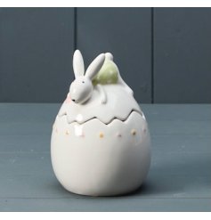 A ceramic storage jar with cute 3D Easter bunny and simple pattern.