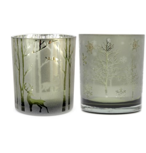 A mix of 2 glass candle holders in an earthy green hue with a frosted finish and silver reflective centre. 