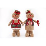 A mix of 2 tall gingerbread decorations with waffle fabric and charming tartan baking outfits. 