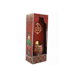 A charming nutcracker style fragranced diffuser with a rich red, gold and green design. 