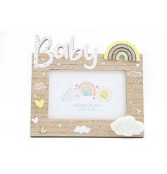A gorgeous wooden photo frame with a pastel rainbow and clouds design. 