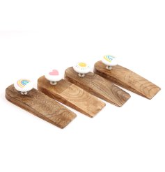 An assortment of 4 natural wooden doorstops each with a ceramic knob featuring a colourful design