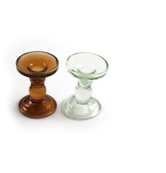 An assortment of 2 chic glass candle sticks in clear and dark honey colours. 