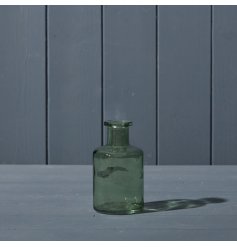A beautiful glass bottle in vintage green.